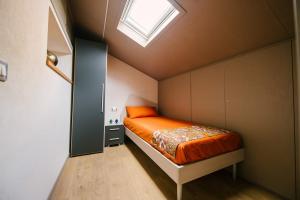 A bed or beds in a room at Le Camere dei Conti