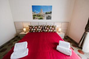 A bed or beds in a room at Le Camere dei Conti