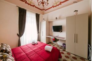 A bed or beds in a room at Le Camere dei Conti