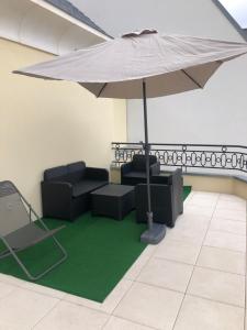 Istumisnurk majutusasutuses Superbe Appartement F4 Puteaux