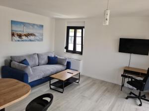 Appartments Akrapovic的电视和/或娱乐中心