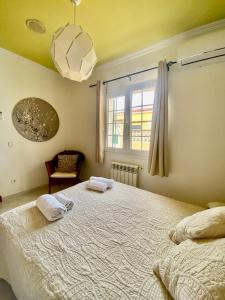 Ένα ή περισσότερα κρεβάτια σε δωμάτιο στο Villa Vistamar +13 φωτογραφίες