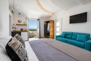 Postel nebo postele na pokoji v ubytování Alizea Villas & Suites + 25 fotografií