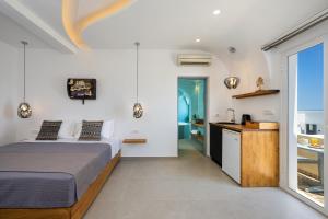 Postel nebo postele na pokoji v ubytování Alizea Villas & Suites