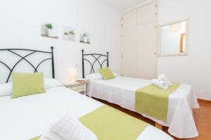 Postel nebo postele na pokoji v ubytování Casa Lluís by Sonne Villas + 29 fotografií