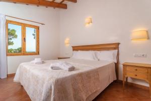 Postel nebo postele na pokoji v ubytování Talaia d'Artrutx + 29 fotografií