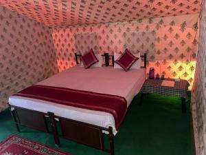 Postel nebo postele na pokoji v ubytování Hotel Nubra Delight and Camps