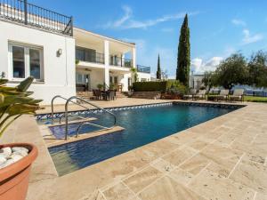 a swimming pool in the backyard of a house at Majestic villa in Gualchos with private pool in Gualchos