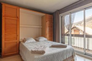 Ліжко або ліжка в номері Le Skieur