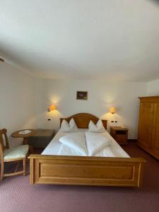 Voodi või voodid majutusasutuse Hotel Larch toas