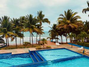 Bazén v ubytování Playa Azul Suites nebo v jeho okolí