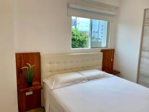 A bed or beds in a room at Suites de Lujo Playa Azul