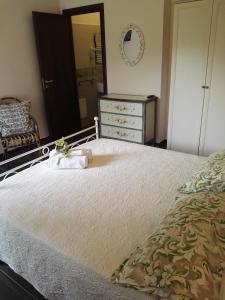 A bed or beds in a room at Villa Rosada