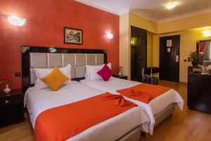 Postel nebo postele na pokoji v ubytování Hotel Meriem Marrakech