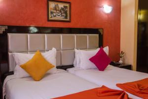 Postel nebo postele na pokoji v ubytování Hotel Meriem Marrakech