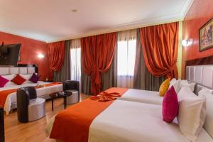 Postel nebo postele na pokoji v ubytování Hotel Meriem Marrakech