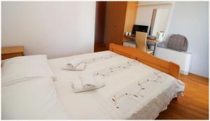 Postel nebo postele na pokoji v ubytování Guest House Lav