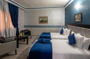 Postel nebo postele na pokoji v ubytování Hotel Meriem Marrakech