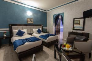 Postel nebo postele na pokoji v ubytování Hotel Meriem Marrakech