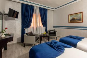 Postel nebo postele na pokoji v ubytování Hotel Meriem Marrakech