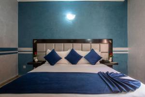 Postel nebo postele na pokoji v ubytování Hotel Meriem Marrakech