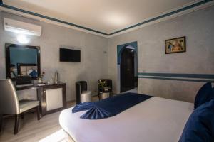 Postel nebo postele na pokoji v ubytování Hotel Meriem Marrakech