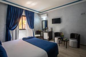 Postel nebo postele na pokoji v ubytování Hotel Meriem Marrakech