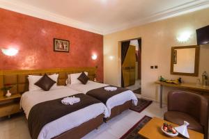 Postel nebo postele na pokoji v ubytování Hotel Meriem Marrakech