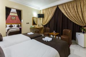 Postel nebo postele na pokoji v ubytování Hotel Meriem Marrakech