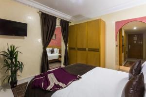 Postel nebo postele na pokoji v ubytování Hotel Meriem Marrakech