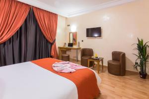 TV a/nebo společenská místnost v ubytování Hotel Meriem Marrakech