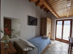 Posteľ alebo postele v izbe v ubytovaní Chalet Lullaby