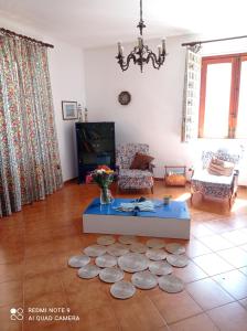 TV a/nebo společenská místnost v ubytování Sunset Cottage