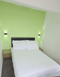 Katil atau katil-katil dalam bilik di Charlton Aparthotel