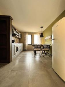 A kitchen or kitchenette at Private Villa at BlackSeaRama Golf & Villas Resort
