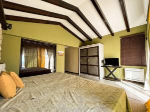 A bed or beds in a room at Private Villa at BlackSeaRama Golf & Villas Resort