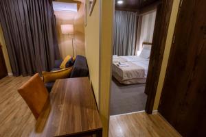Postel nebo postele na pokoji v ubytování Apart Hotel West