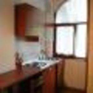a kitchen with a sink and a window at Appartamento Monolocale Moneglia 34 in Moneglia +5 photos