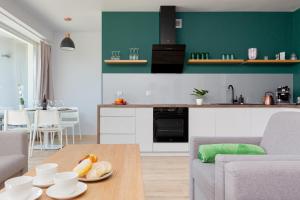 Kuchyň nebo kuchyňský kout v ubytování Two-bedroom Apartment Jodłowa in the Mountains by Renters