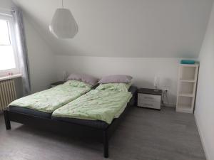Postel nebo postele na pokoji v ubytování Ferienwohnung-Abendsonne