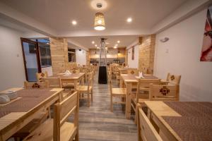 Restoran atau tempat lain untuk makan di Ayni Cusco Hotel