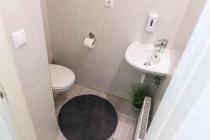 Kúpeľňa v ubytovaní Real Apartments Révay