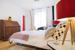Ein Bett oder Betten in einem Zimmer der Unterkunft Apartamento Plaza Mayor III en Madrid