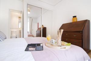Ein Bett oder Betten in einem Zimmer der Unterkunft Apartamento Plaza Mayor III en Madrid