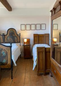 Giường trong phòng chung tại Alloggio Sole