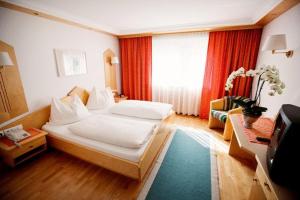 Postel nebo postele na pokoji v ubytování Pension Clara