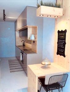 Küche/Küchenzeile in der Unterkunft Apartamento T1 no centro TÊ-U
