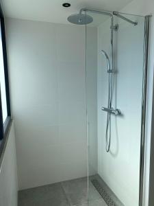 Koupelna v ubytování Luxe vakantiewoning in Domburg, Vaandragerstraat