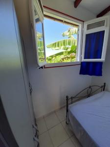 Postel nebo postele na pokoji v ubytování Anais location 971 Guadeloupe