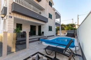 Balkón nebo terasa v ubytování Apartment in Supetar with sea view, balcony, air conditioning, W-LAN 3553-3